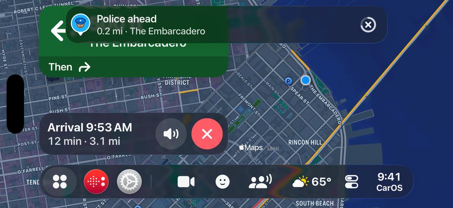 A police alert banner over the navigation map, with road alerts pinned along the route