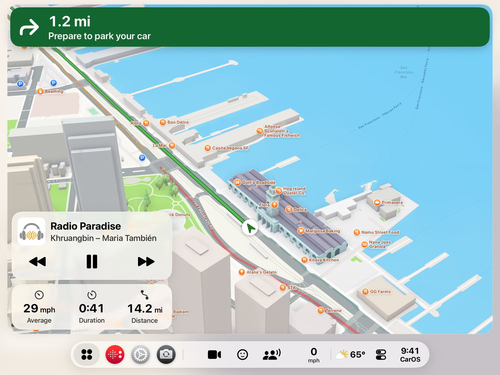 CarOS on iPad Air in light mode: the map full screen with the next turn, the player and the trip figures